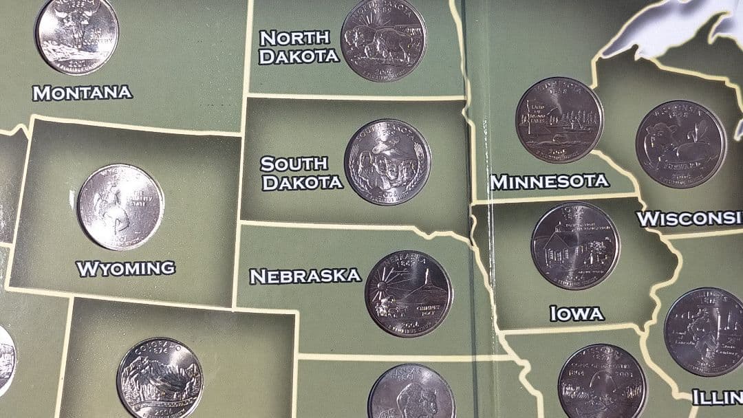 ☆。アメリカ25セントクォーター50州記念アルバム(56枚在中)。