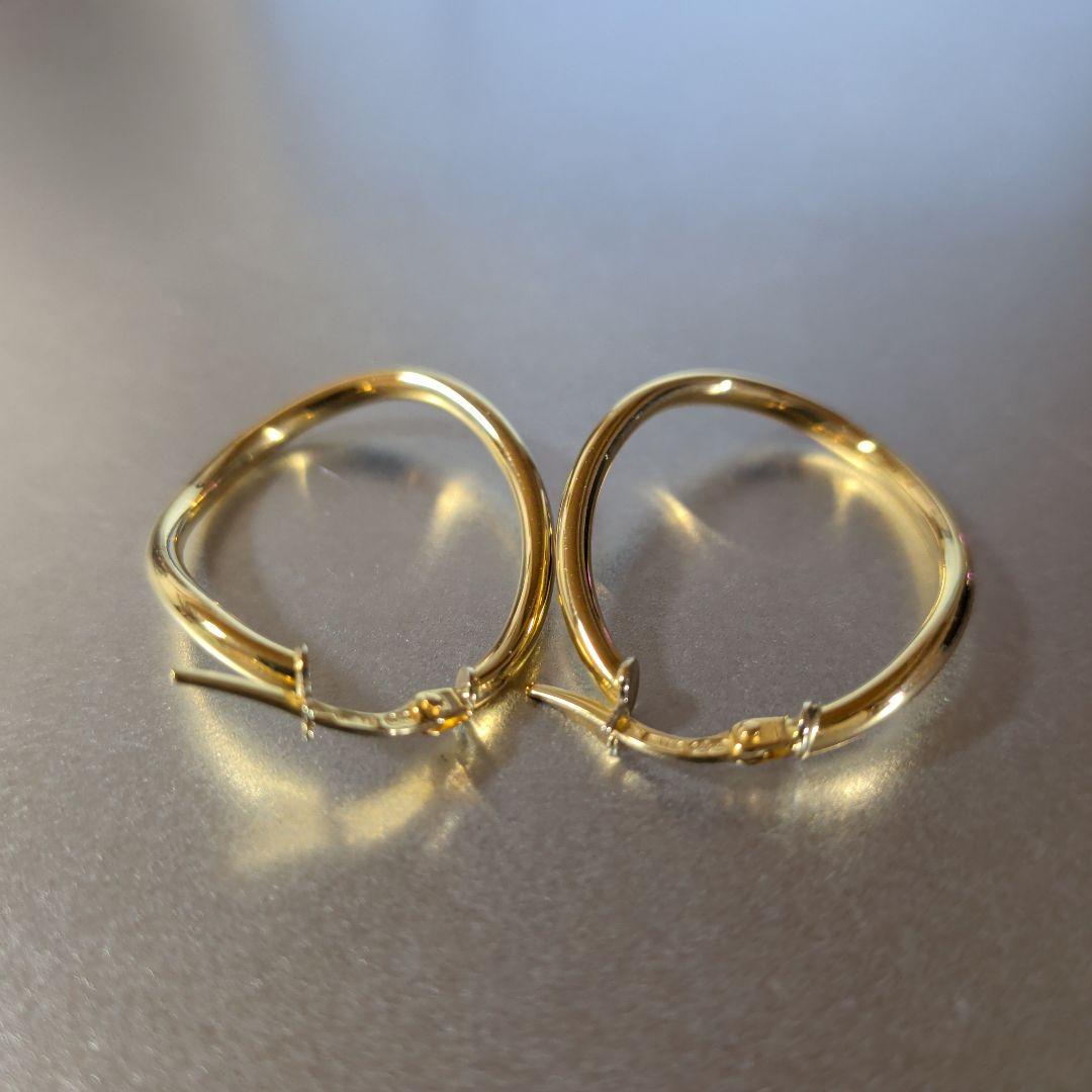 ピアス　UNOAERRE　750　YG　スナップ　ウェーブ　2.59g