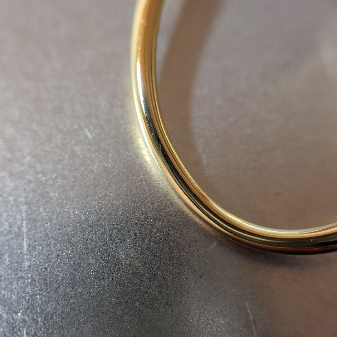 ピアス　UNOAERRE　750　YG　スナップ　ウェーブ　2.59g