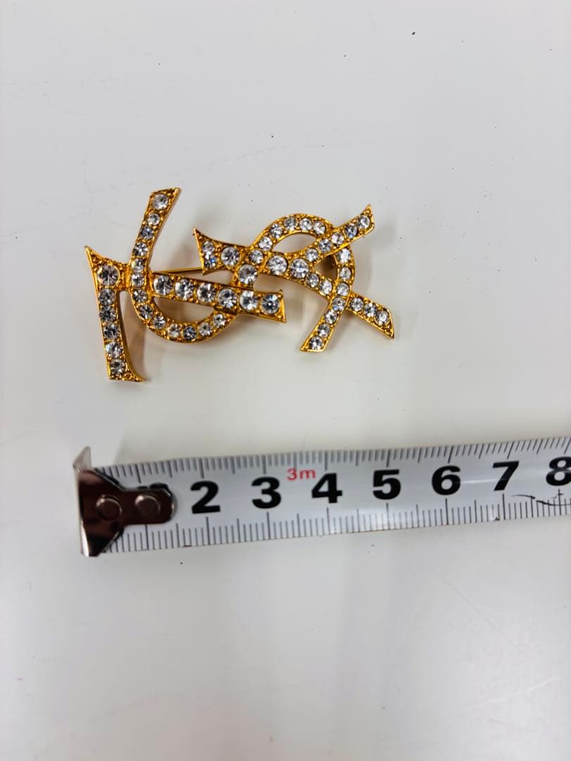 YSL ゴールドブローチ クリスタル装飾