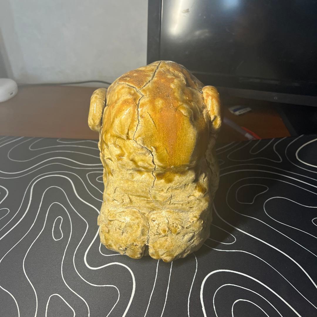 陶土製 人間と犬の顔の彫刻