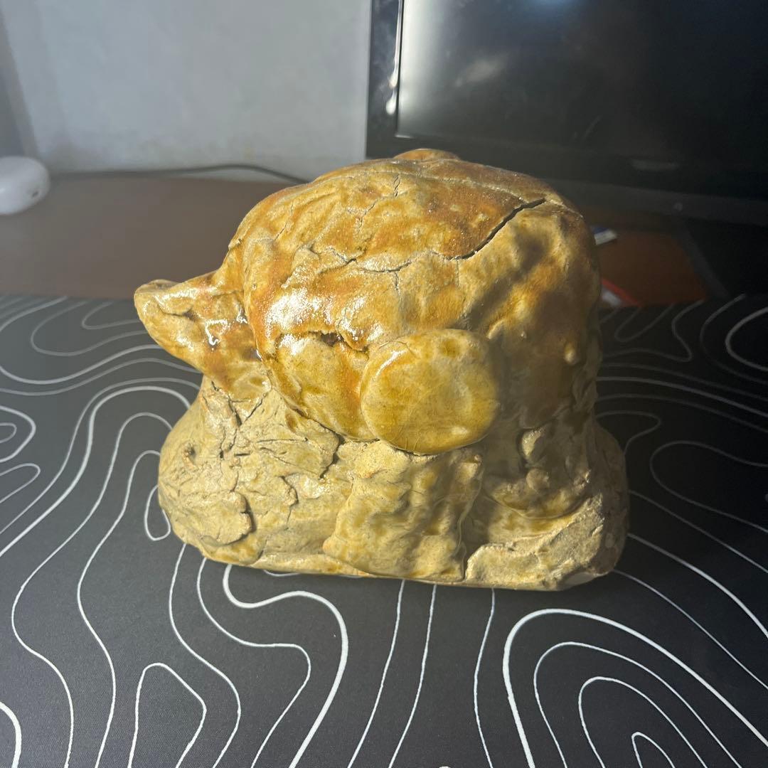 陶土製 人間と犬の顔の彫刻