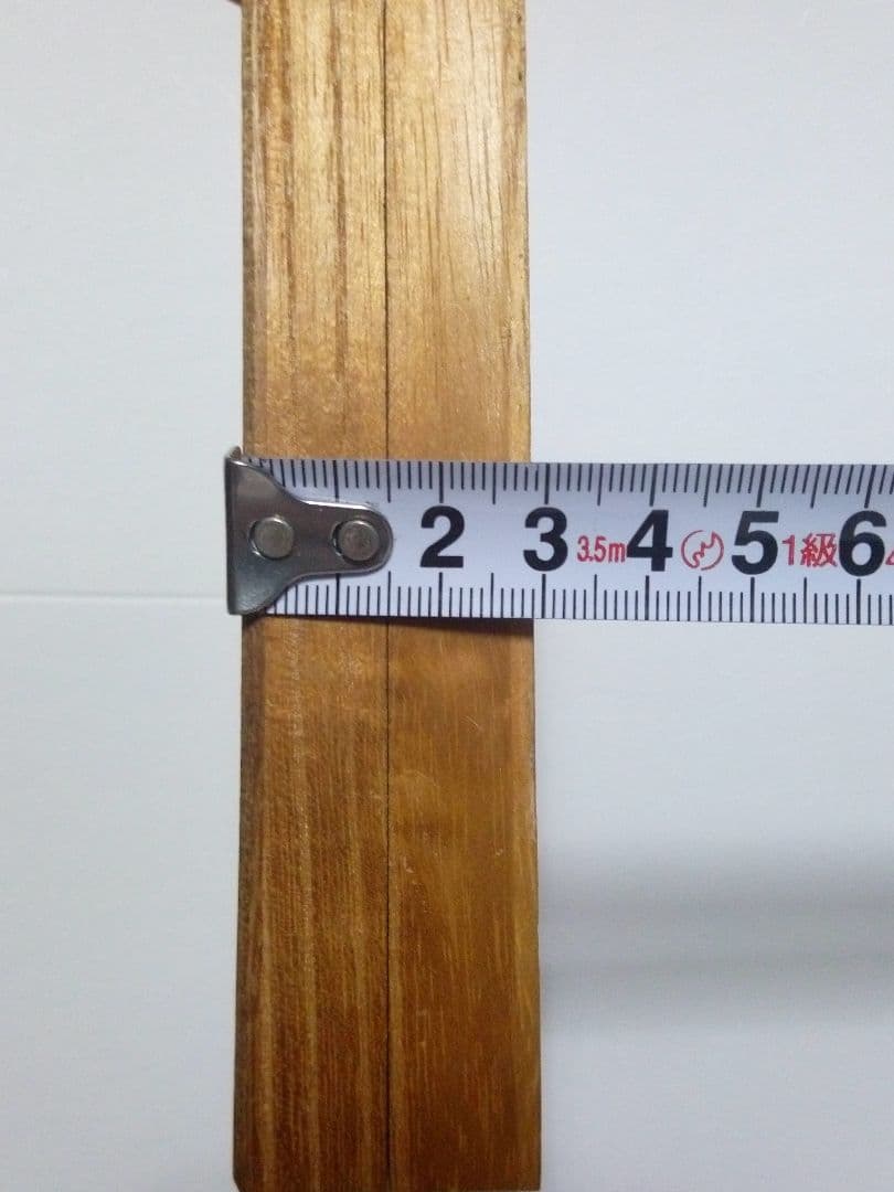 新国劇　創立六十周年記念品　鍔型文鎮（？）