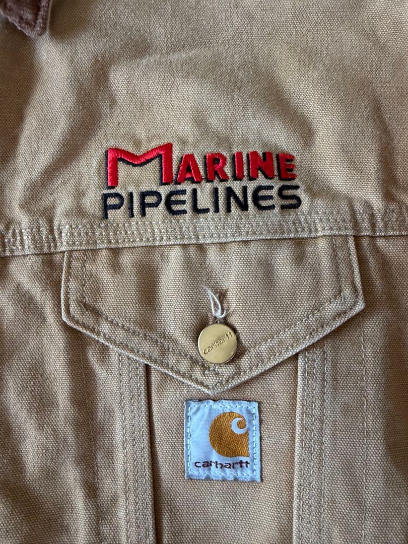 Carhartt ベージュジャケット MARINE PIPELINES