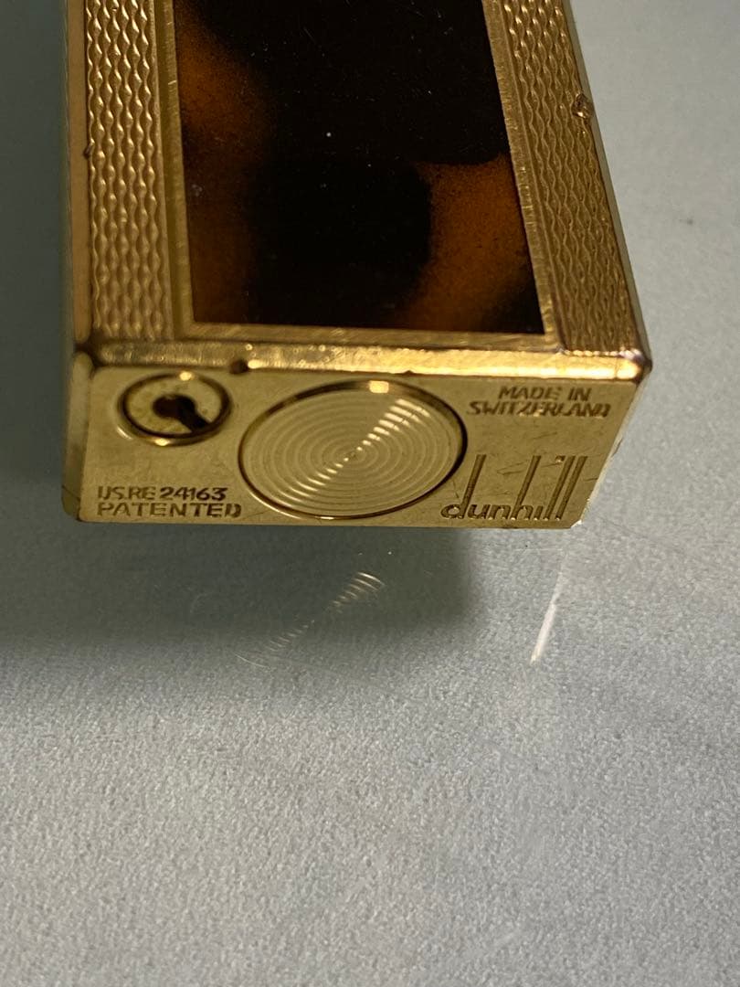 ダンヒルゴールドと茶色のライター本体