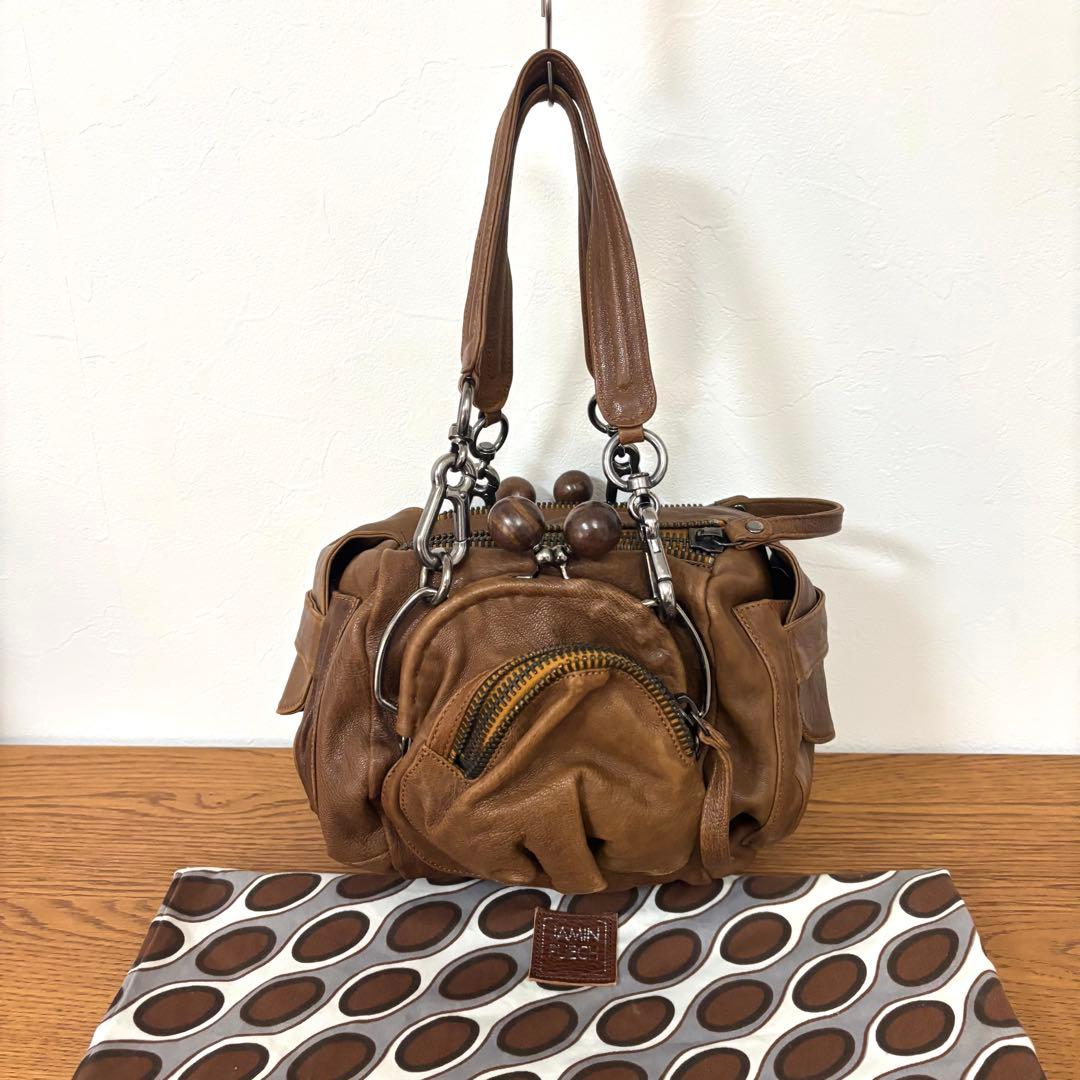 ジャマンピュエッシュ　レザー　ハンドバッグ　木製パーツ　がま口　総柄