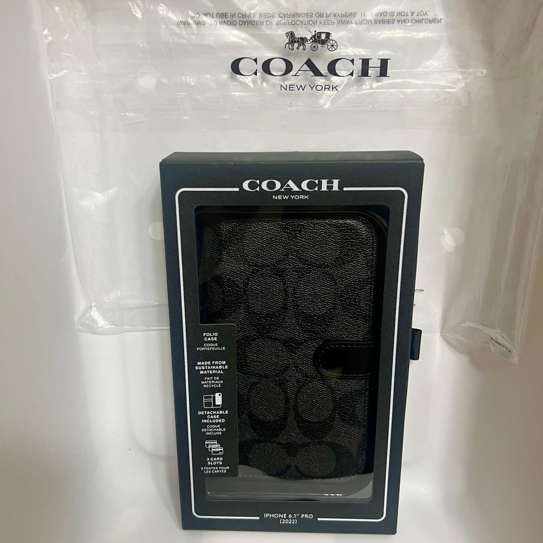 COACH iPhone14PROケース フォリオ・シグネチャー キャンバス