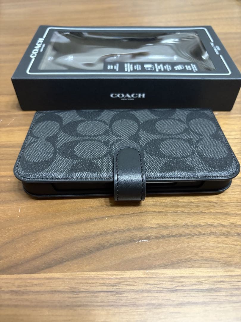 COACH iPhone14PROケース フォリオ・シグネチャー キャンバス