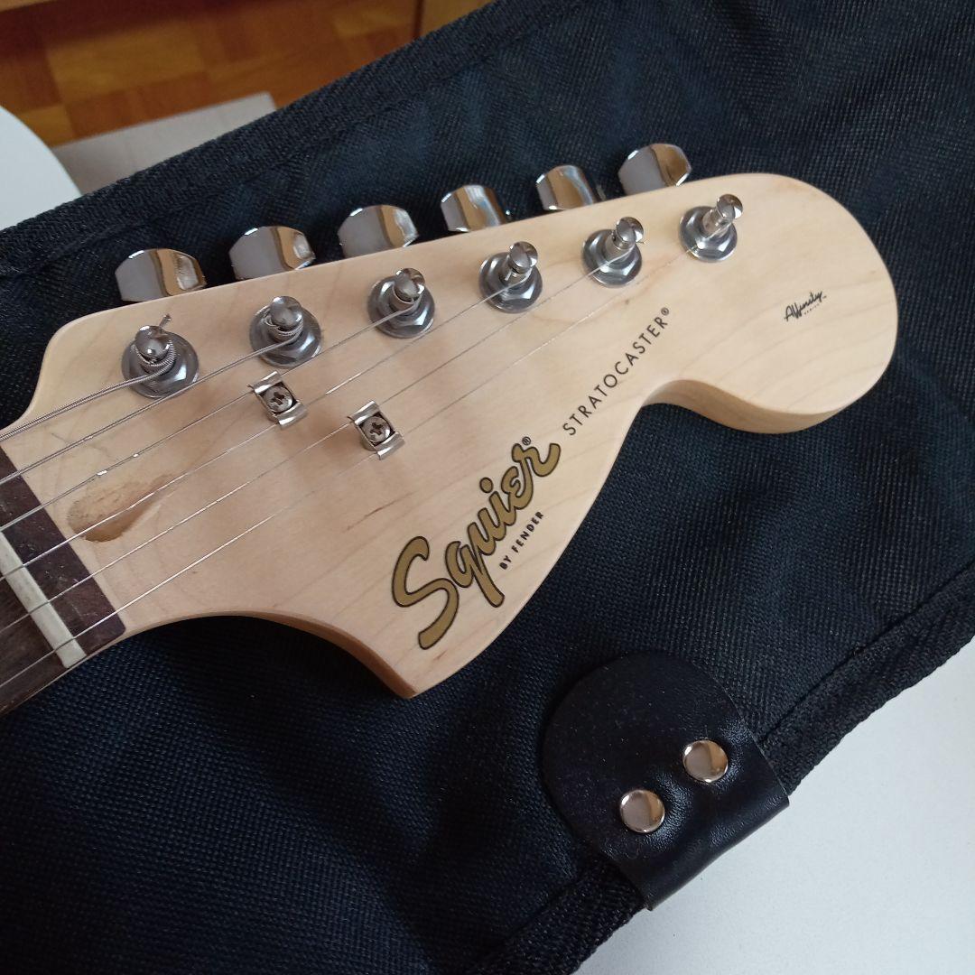 エレキギター　squier　ピンク