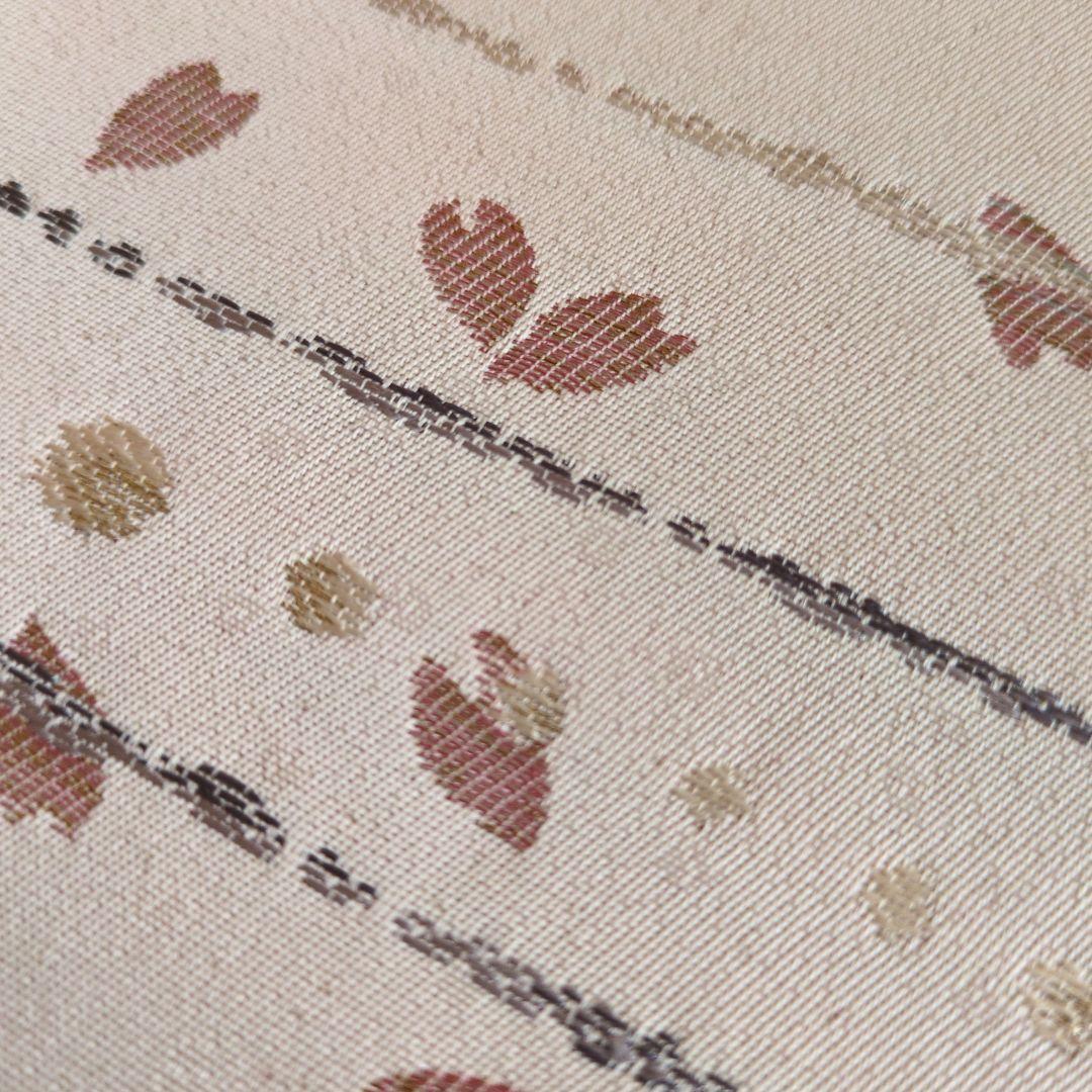 未使用　正絹袋帯　河瀬満織物　横段に花弁散らし　証紙アリ