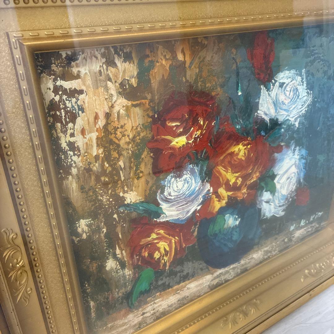 花瓶に入ったバラの油彩画