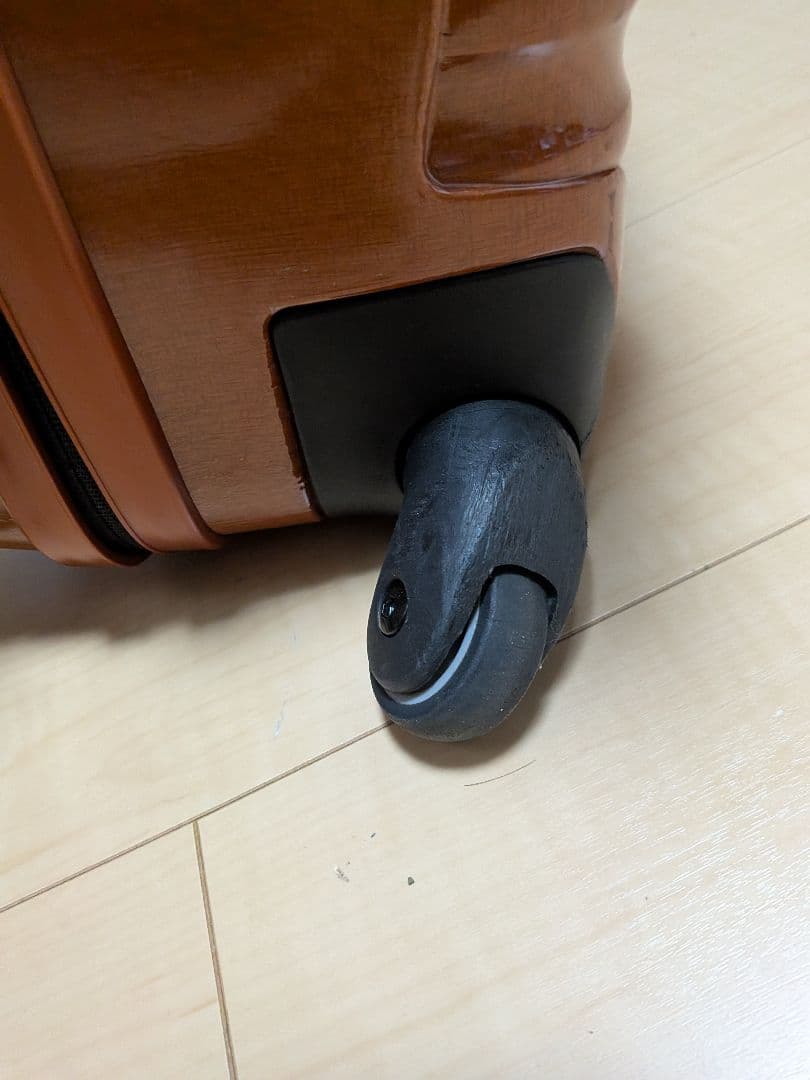 サムソナイト 波状テクスチャー キャリーケース コスモライト 4輪 オレンジ