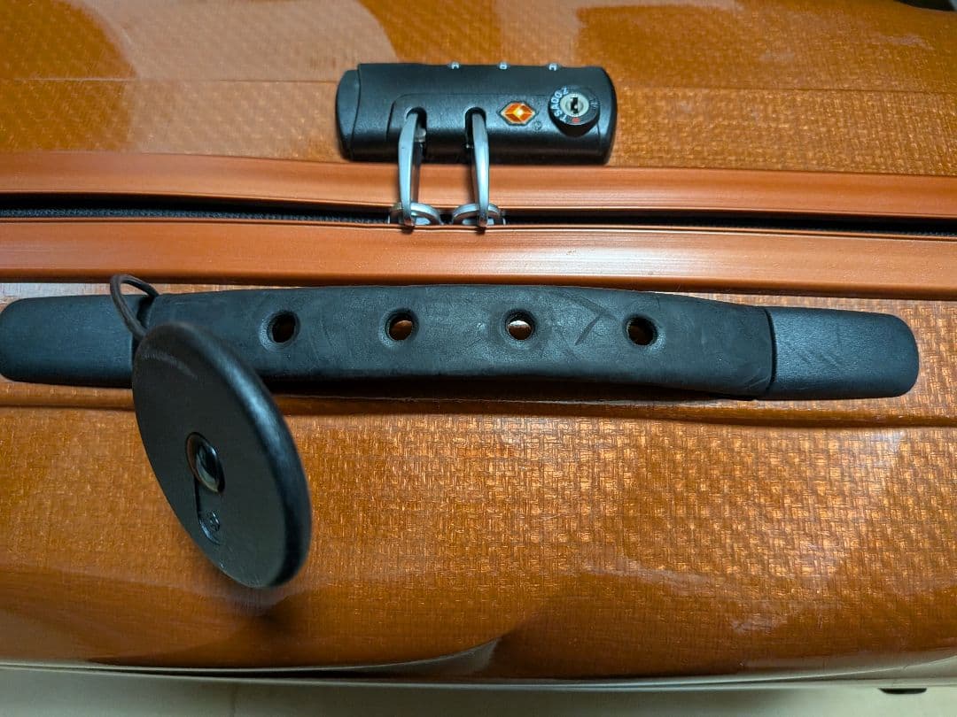 サムソナイト 波状テクスチャー キャリーケース コスモライト 4輪 オレンジ