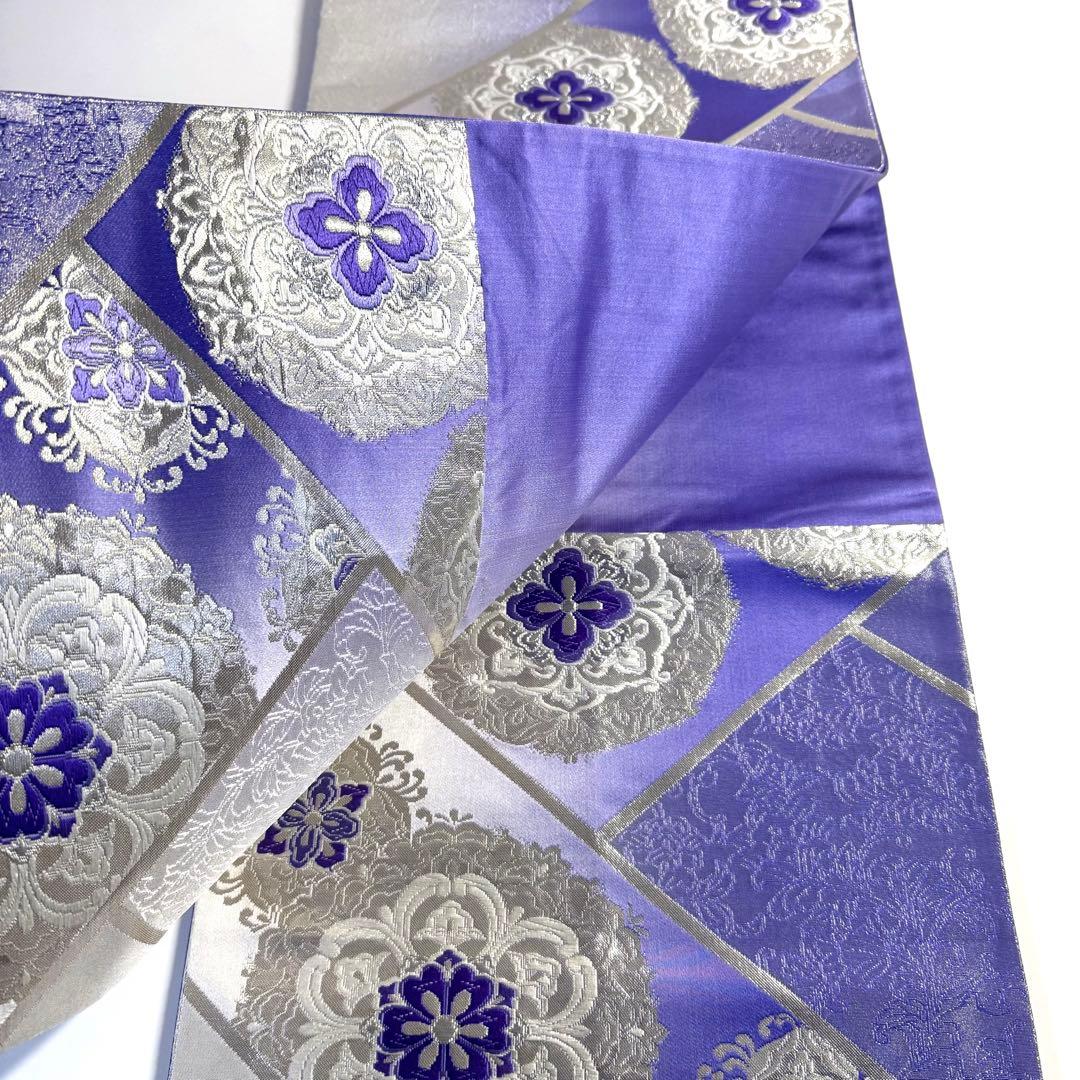 5k2491 袋帯　絹　唐織　正倉院文様　華文　紫　銀色　白　花柄　和装　着物