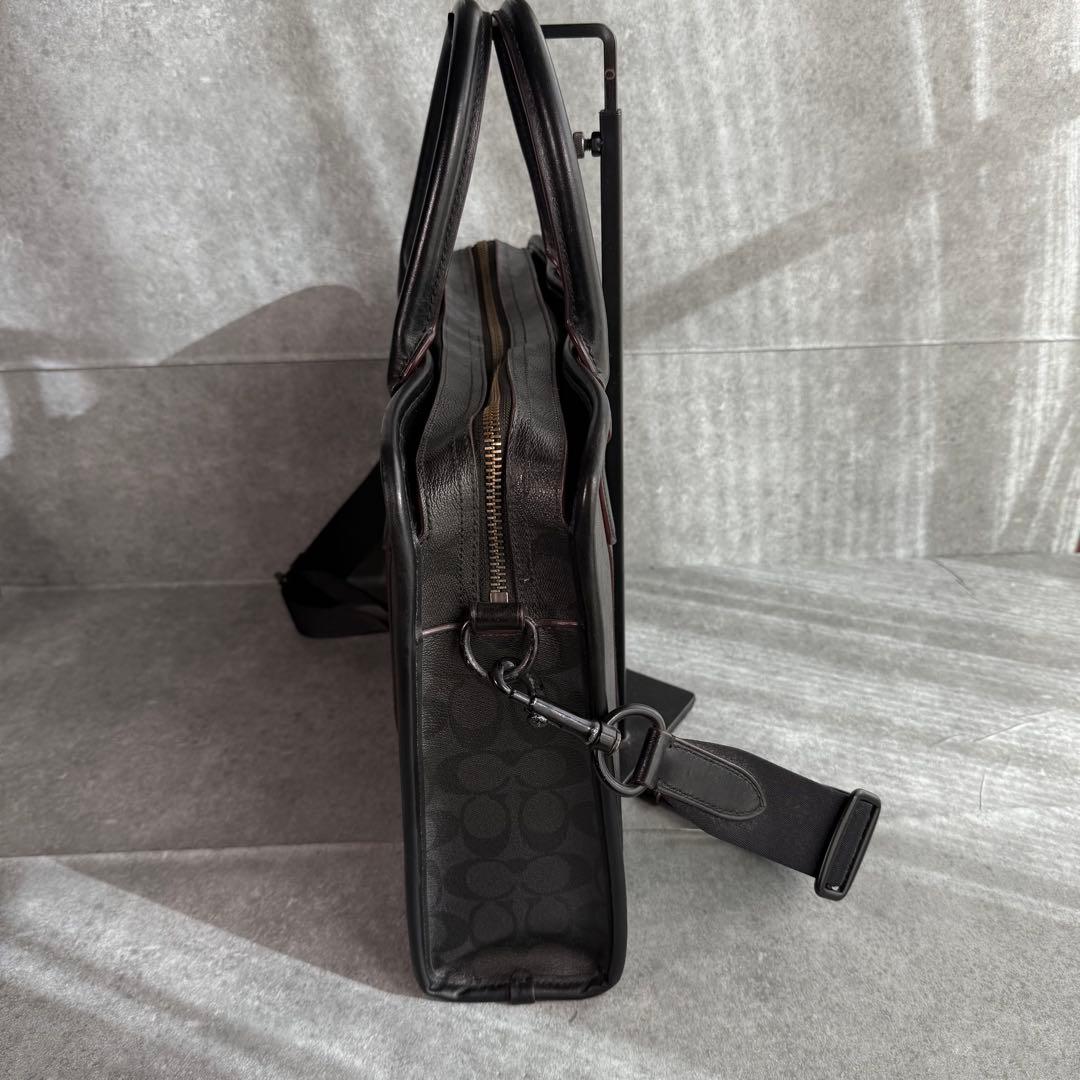 良品 コーチ ビジネスバッグ A4収納可 シグネチャー F23212