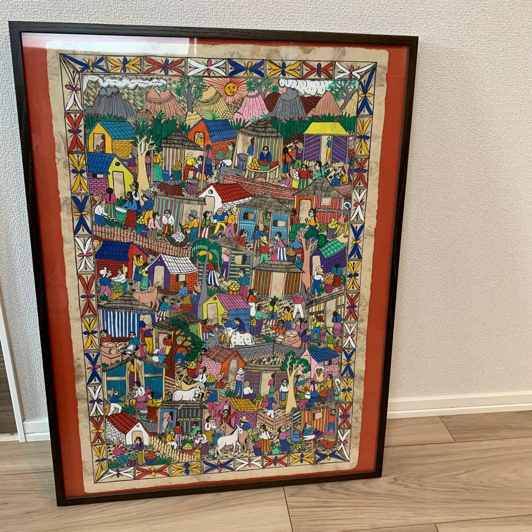 メキシコの村落　カラフルな民俗画