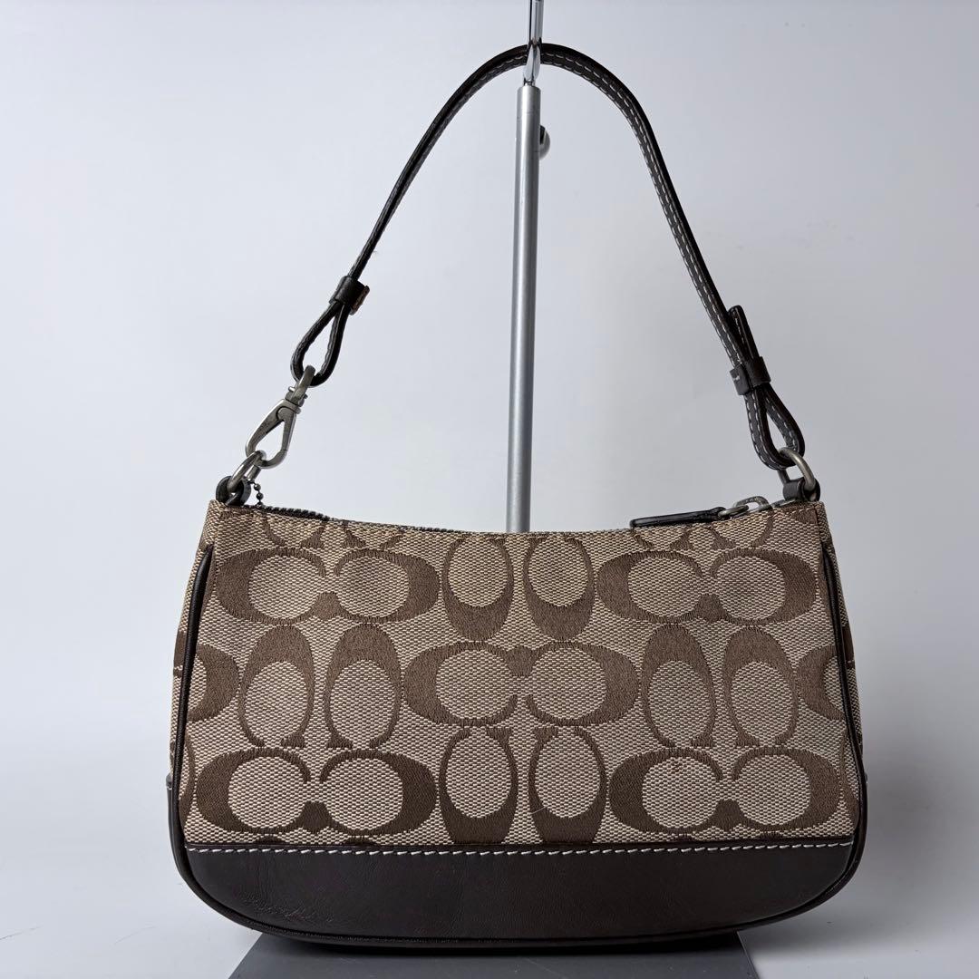 コーチ アクセサリーポーチaccessory pouch6094チャームブラウン