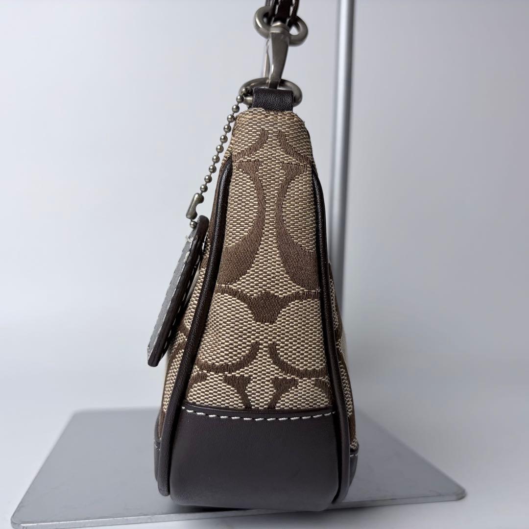 コーチ アクセサリーポーチaccessory pouch6094チャームブラウン