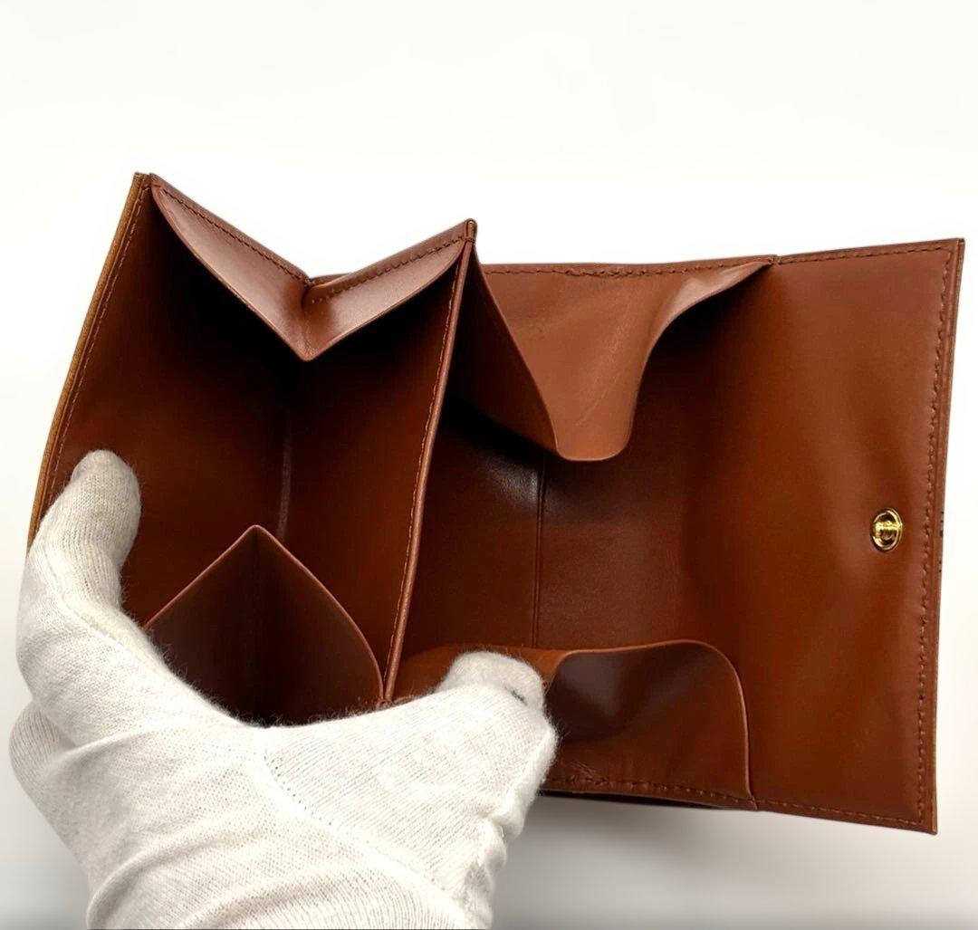 新品・未使用MCM エムシーエム 三つ折り財布 レザーブラウンロゴ入り