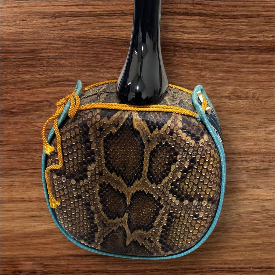 【ネッシー】沖縄三線 蛇本革布生地ソフトカバー＆弦３本＆駒