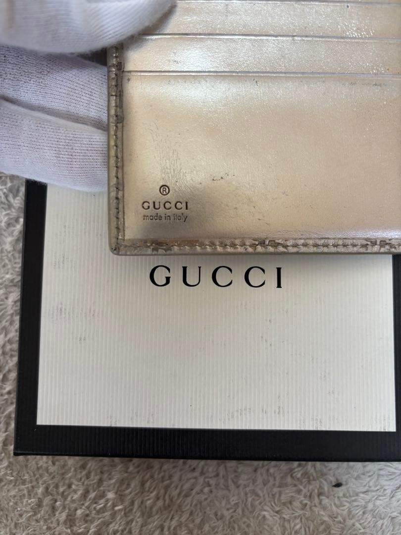 8*様 GUCCI ゴールド　二つ折り財布　グッチ　GGマーク
