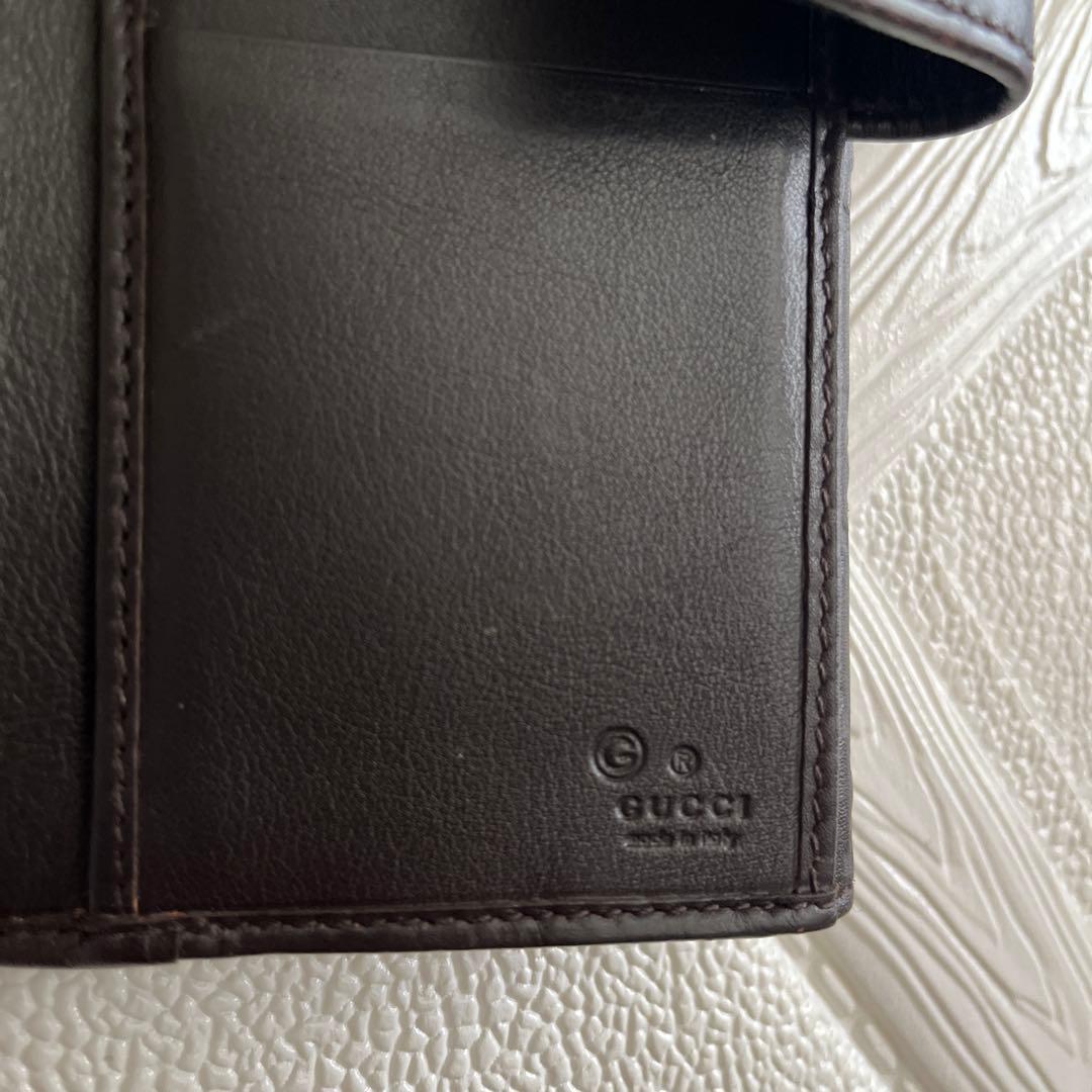 GUCCI 財布　ブラウンレザー 二つ折り財布　型押し