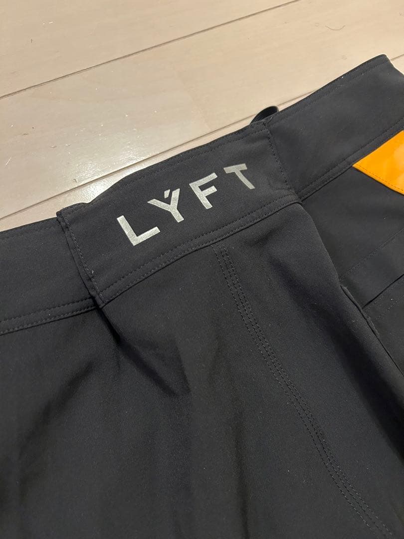 LYFT 【L】ステージショーツ　黒/オレンジ