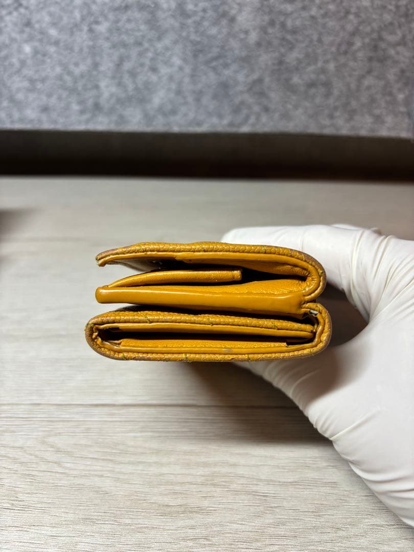 SAINT LAURENT イエロー三つ折り財布