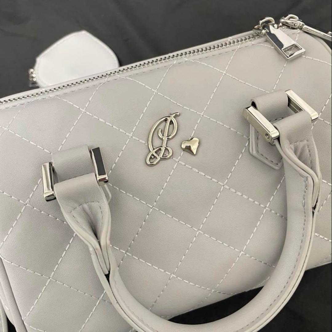 pium ハートポーチ付きキルティングボストンバッグ