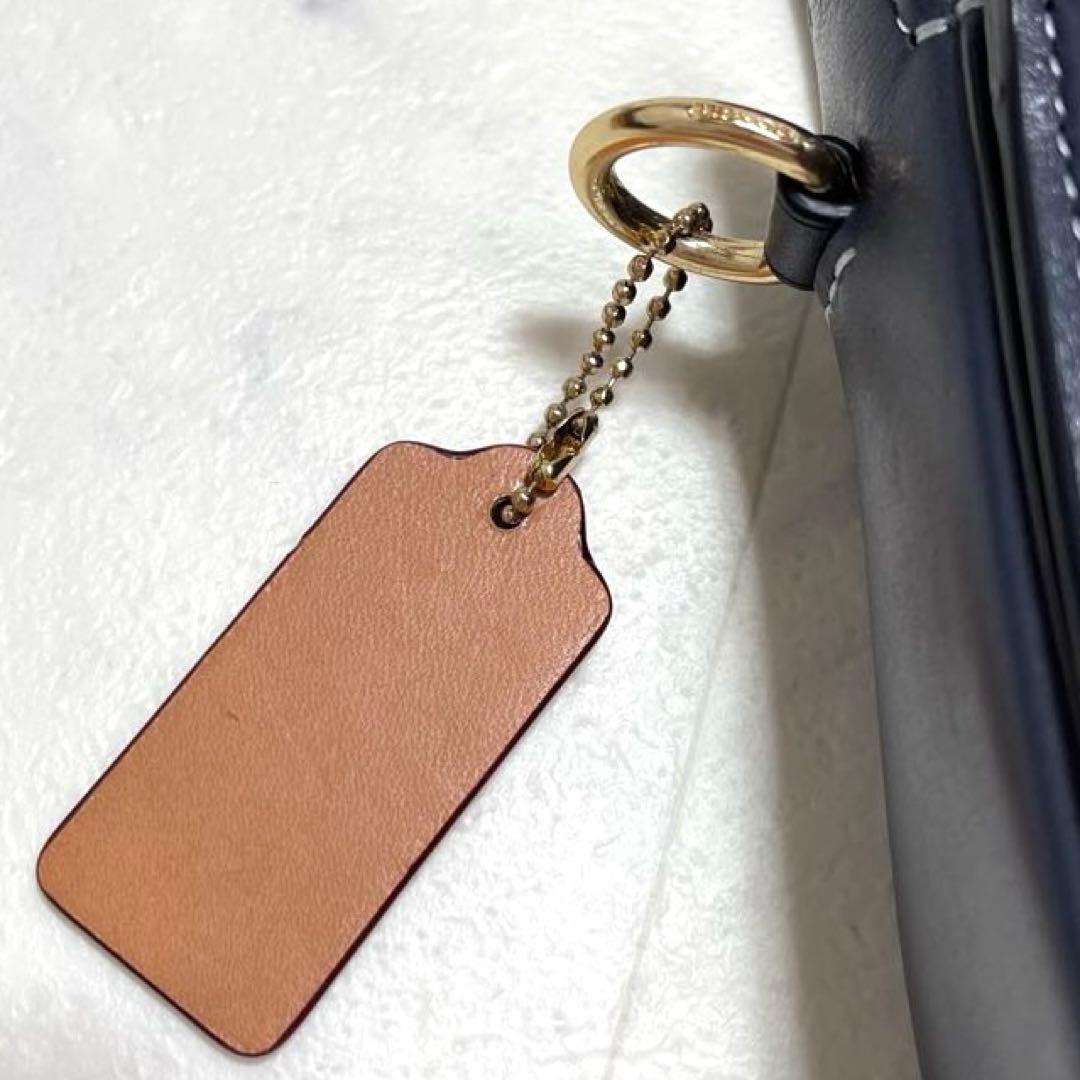 マイメロ✨コーチ ショルダーバッグ ジョージー サドルバッグ シグネチャー