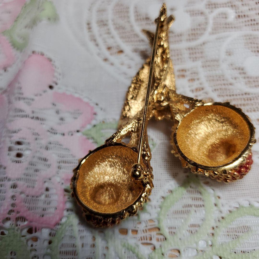 Carven 金色の花束ブローチ