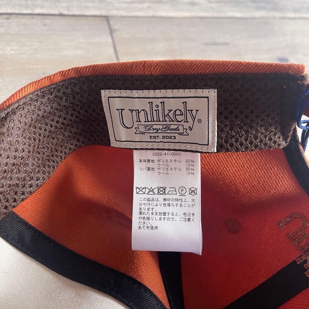 Unlikely Team Capアンライクリー26SSキャップ オレンジ帽子