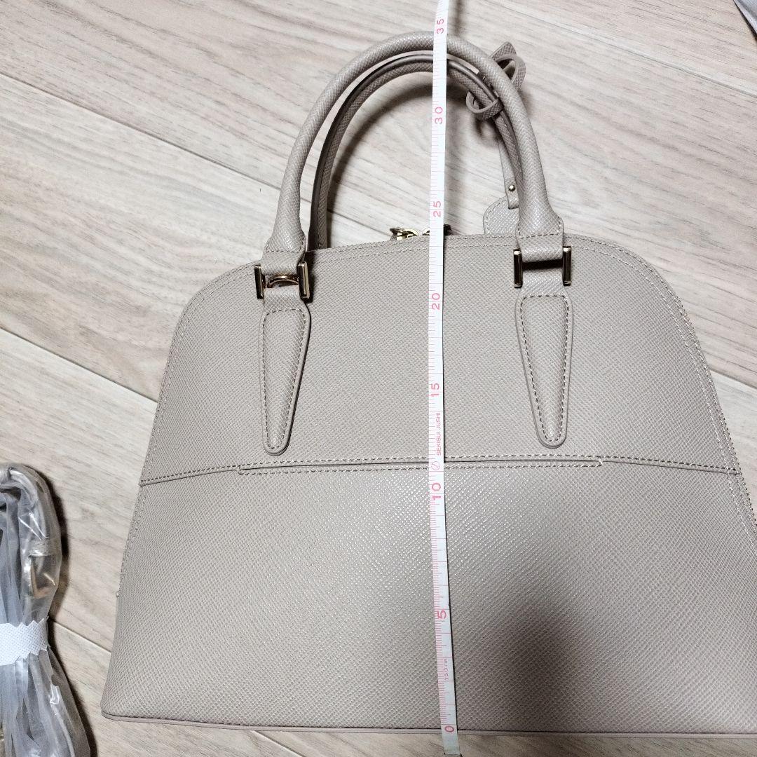 ベージュ　ハンドバッグ　トートバッグ　23区　フォーマルバッグ　ブガッティ型