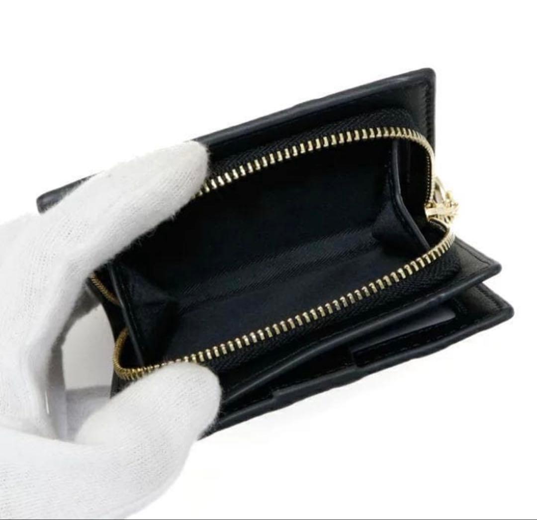 COACHコーチ ミニ財布 二つ折り キーホルダー エンボスシグネチャー