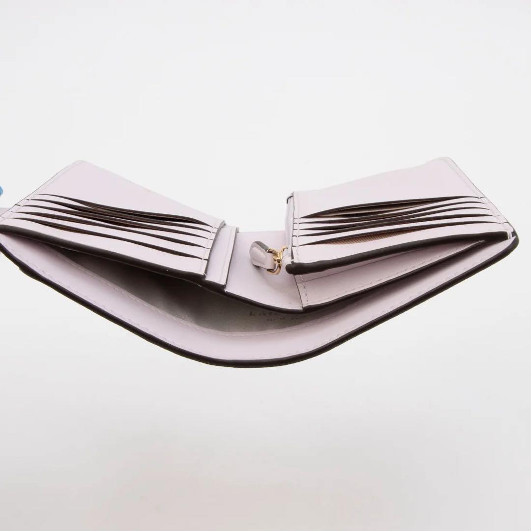 ケイトスペードニューヨーク　バタフライ＆フローラルカットワークウォレット