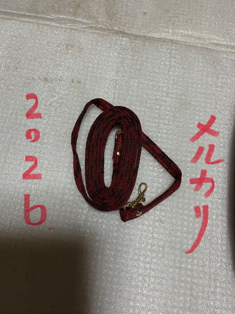 コーチ多用途財布／赤柄。【新品未使用品　長財布】。