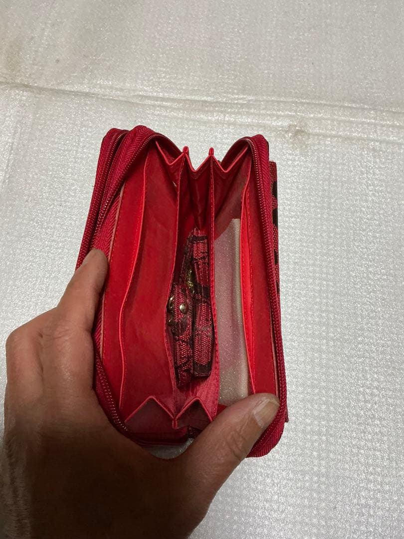 コーチ多用途財布／赤柄。【新品未使用品　長財布】。