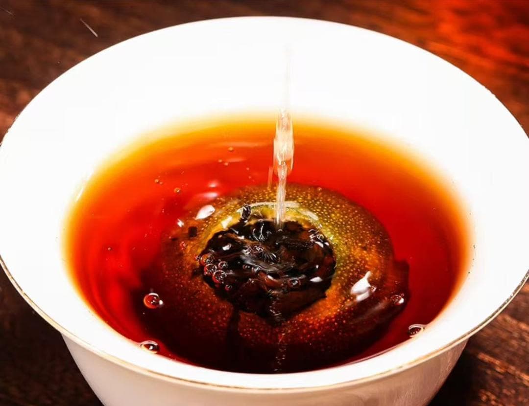 滇聘号勐海産のプーアル熟茶金芽古树茶柑