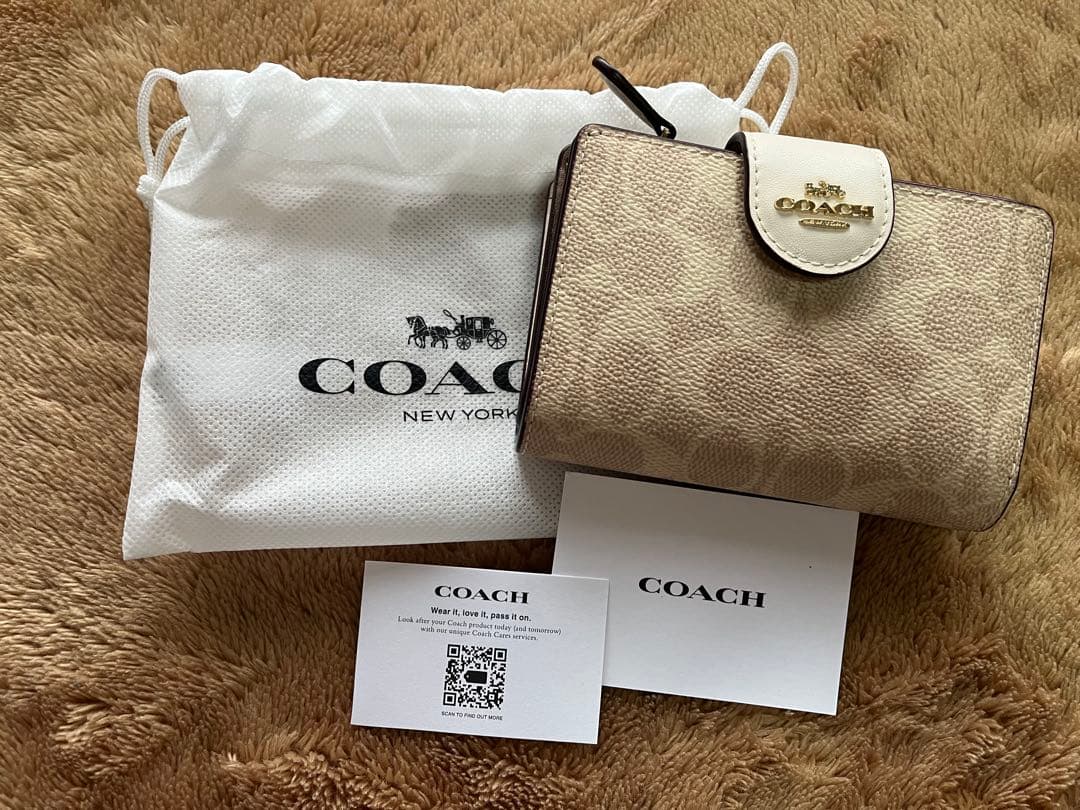現状維持 COACH 二つ折り財布 ベージュ