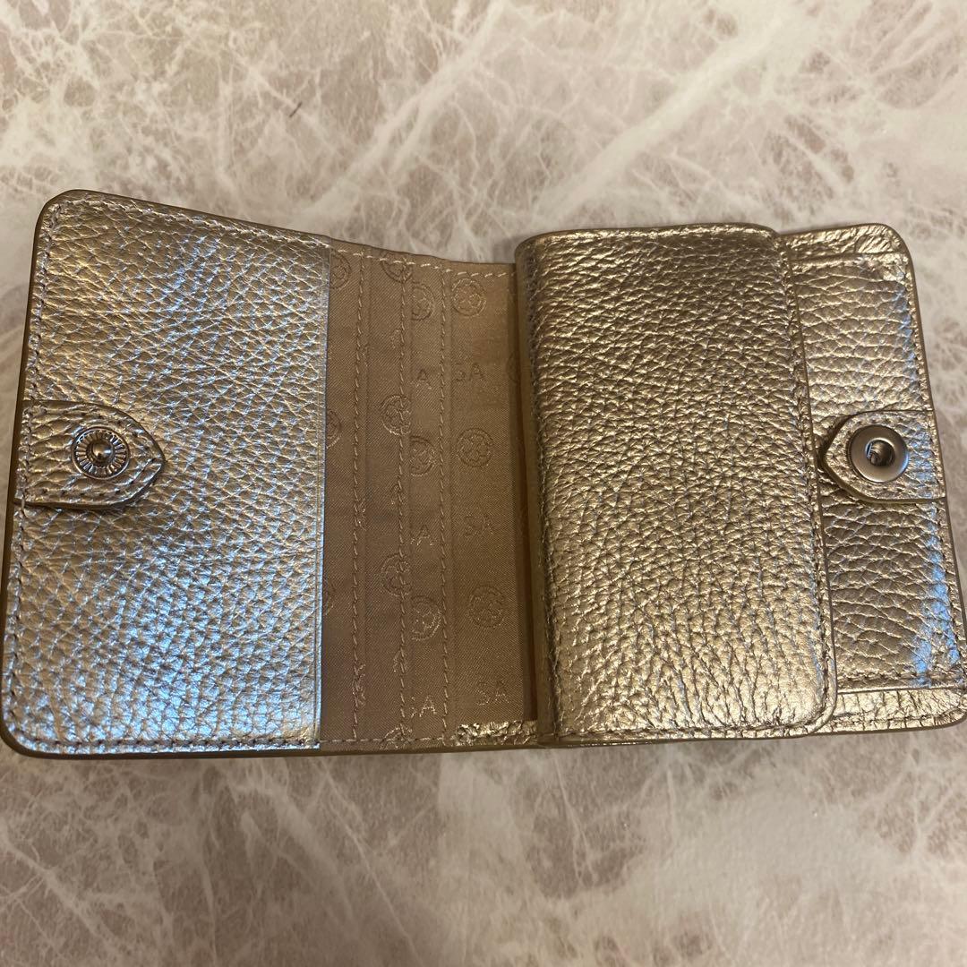 サロンドアルファード　ルクーチェ　二つ折りミニ財布　ゴールド　スマイル