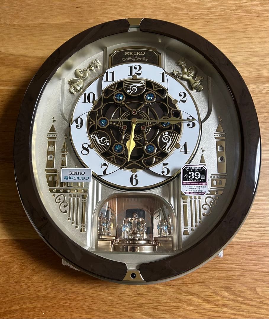 RE579B 電波時計 セイコー 掛時計 壁掛け時計　メロディ機能付き回転飾り