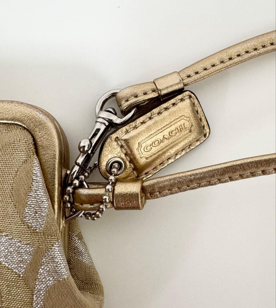 COACH がま口　キスロック　クラッチ　ゴールドラメ　コーチ