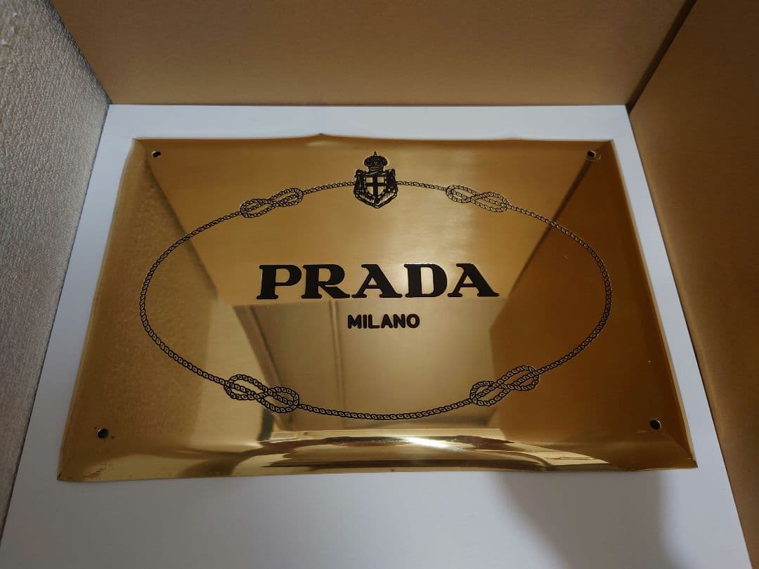 PRADAロープロゴ　ストアギャランティゴールドプレート