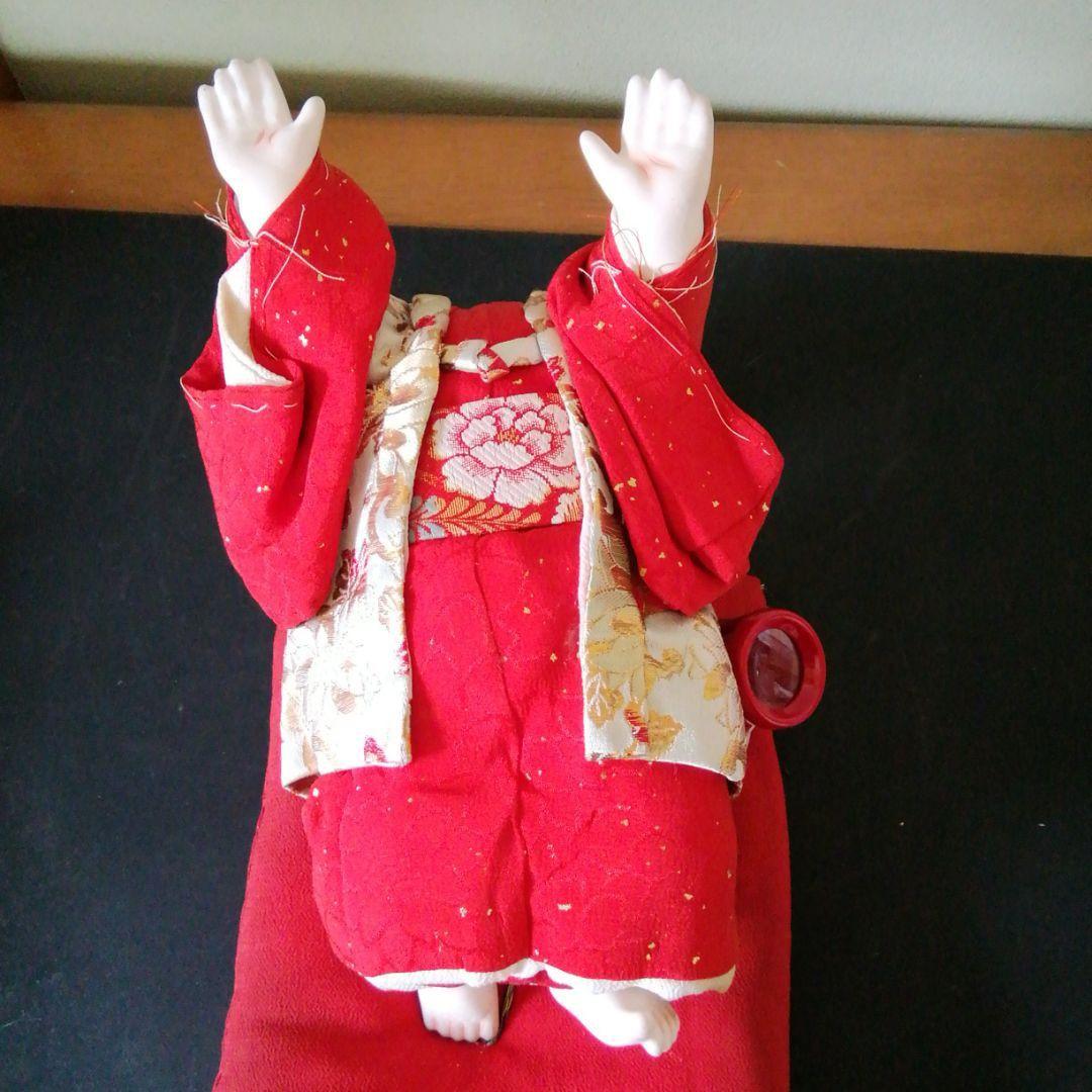 ハイハイ人形。