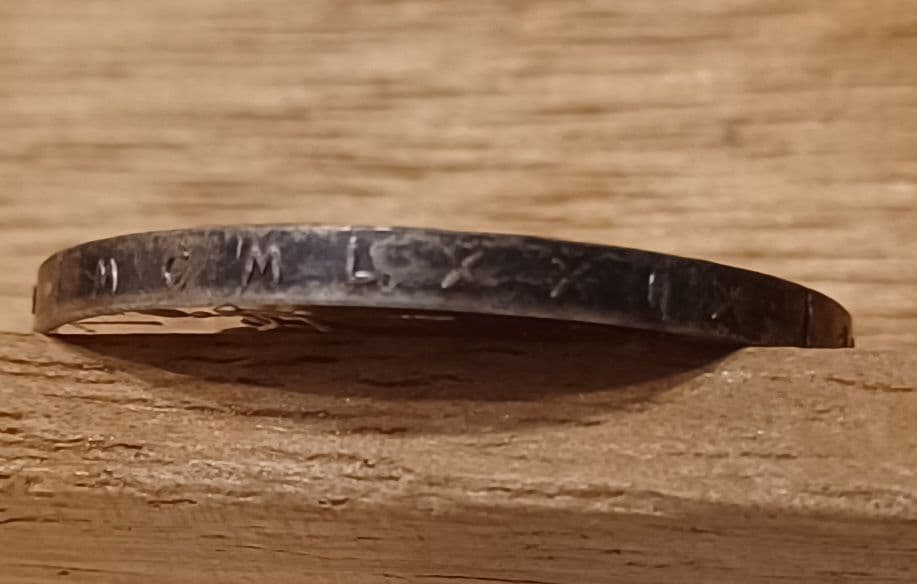 教皇として初めて日本を訪問し世界平和と人権擁護に尽力したヨハネ・パウロ2世の銀貨