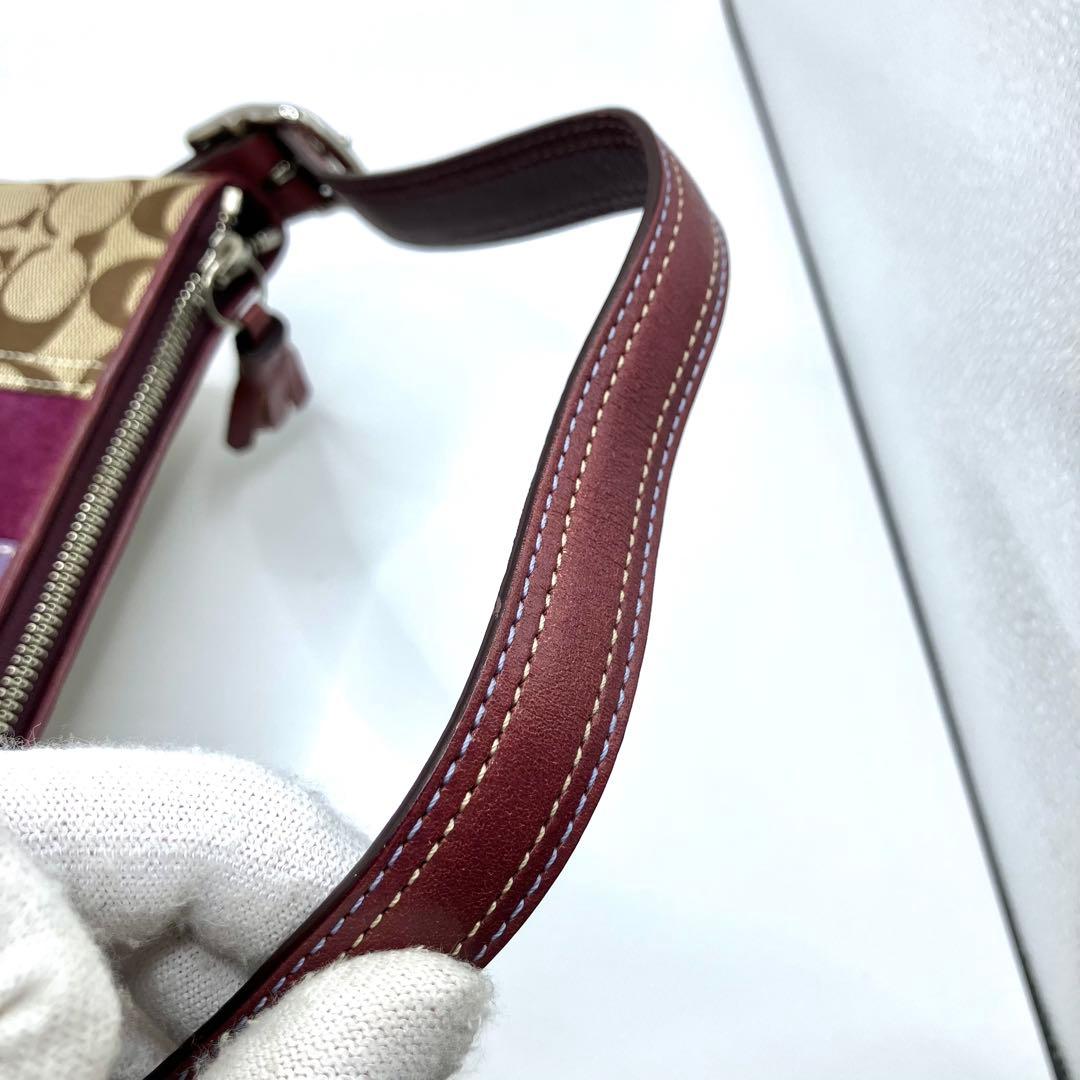 【美品】COACH コーチ ハンドバッグ アクセサリーポーチ シグネチャー　紫