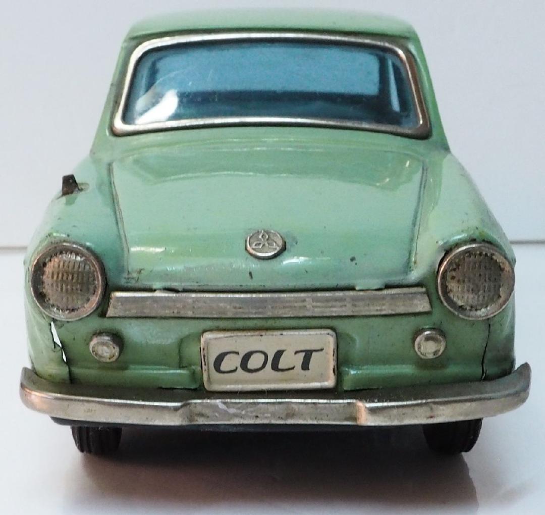 萬代屋【三菱コルト デラックス黄緑ミラー欠ホイル1個交換】フリクション ブリキ製