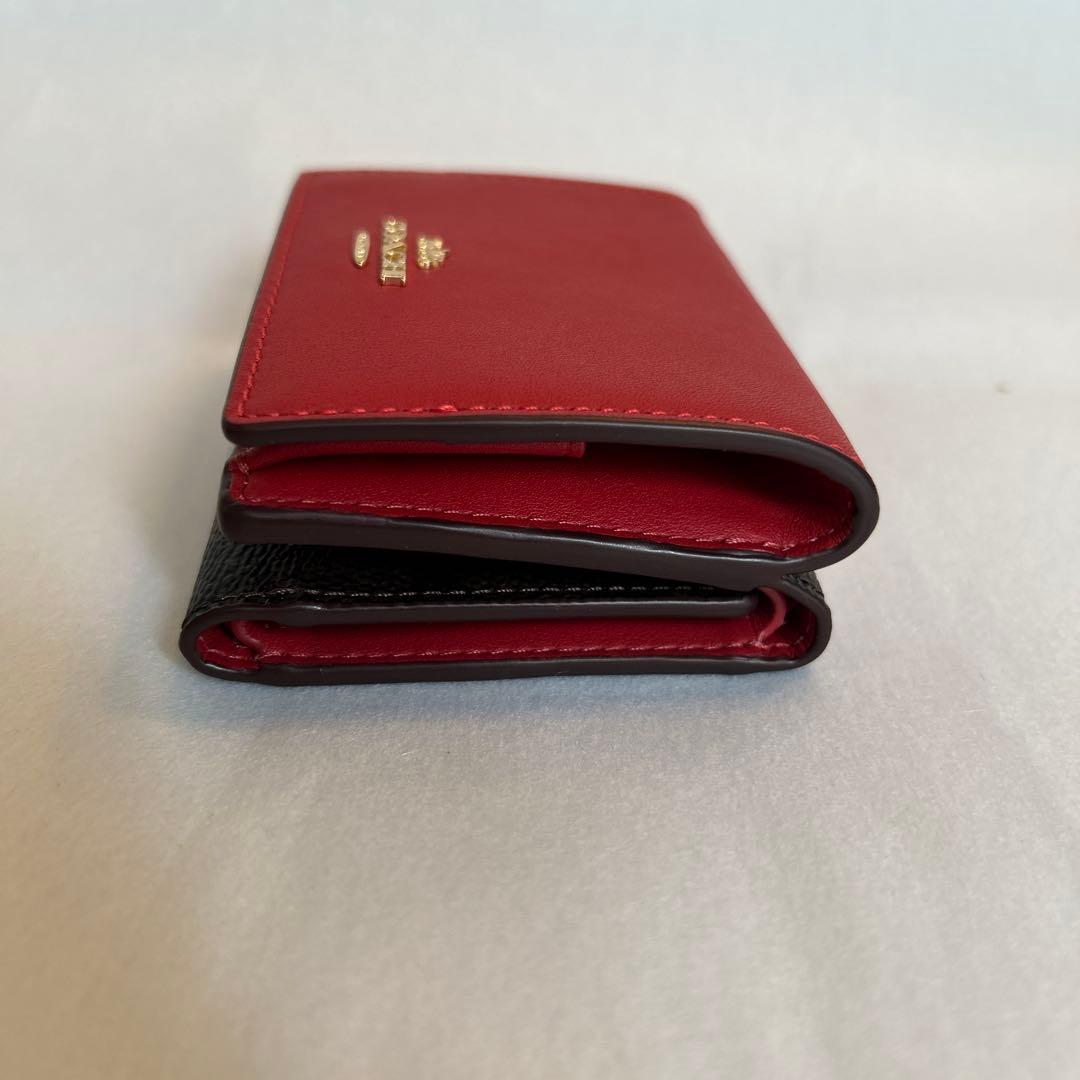 【未使用】コーチ三つ折り財布　赤×シグネチャー