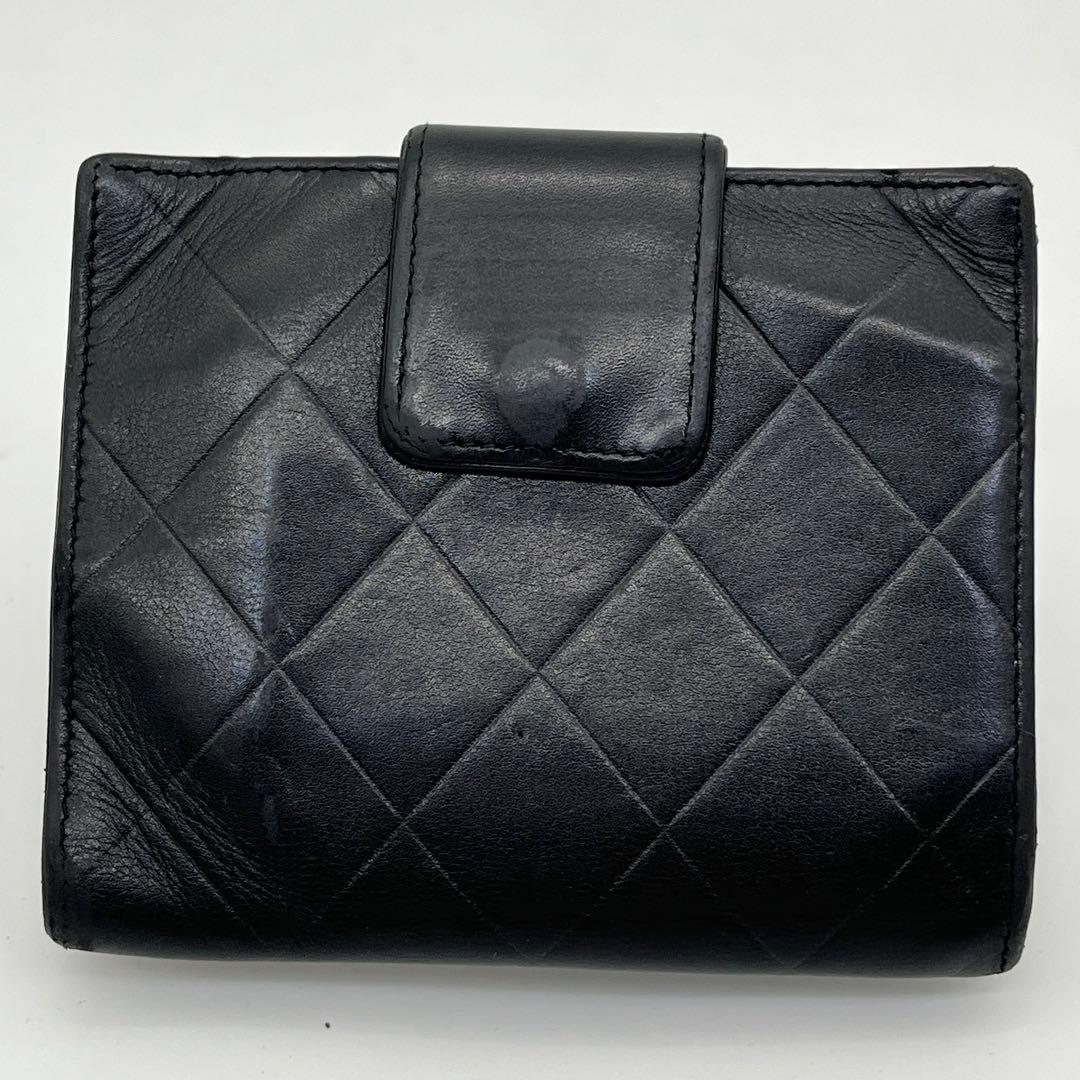 CHANEL 二つ折り財布 コンパクト ロゴ型押し 黒 レザー キルティング
