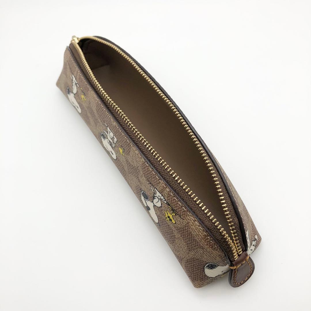 COACHxPEANUTSコラボ ★大人気★ ペンシルケース スヌーピー 新品